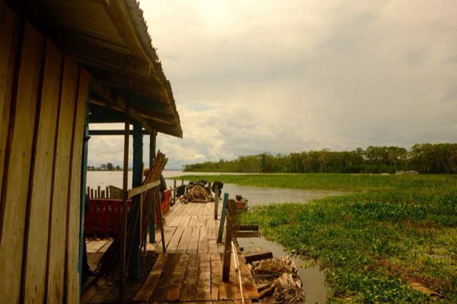 Jetty beside a riverside house from Max Nicholson's archive