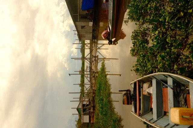 Boats beside floating houses from Max Nicholson's archive