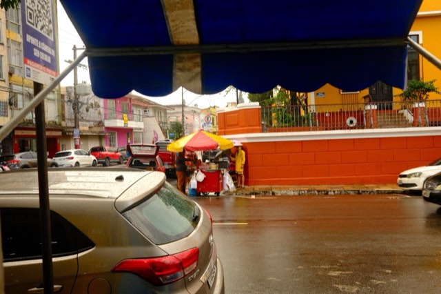 Rainy street food stall from Max Nicholson's archive