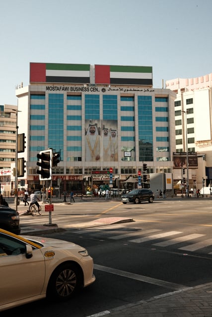 Traffic beneath the UAE flags from Max Nicholson's archive