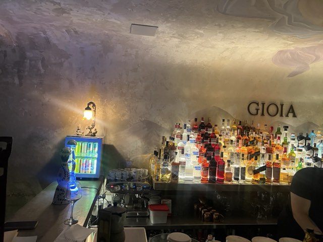 Backlit bottles at Gioia bar from Max Nicholson's archive