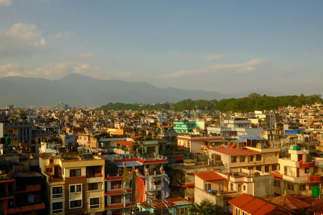Kathmandu neighborhood beneath the hills from Max Nicholson's archive