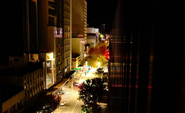 Night street between towers from Max Nicholson's archive