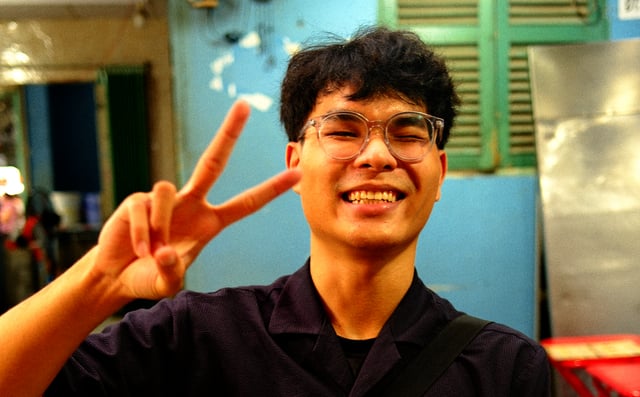 Peace sign at dinner from Max Nicholson's archive