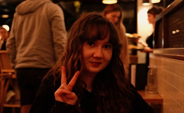 Peace sign at dinner from Max Nicholson's archive
